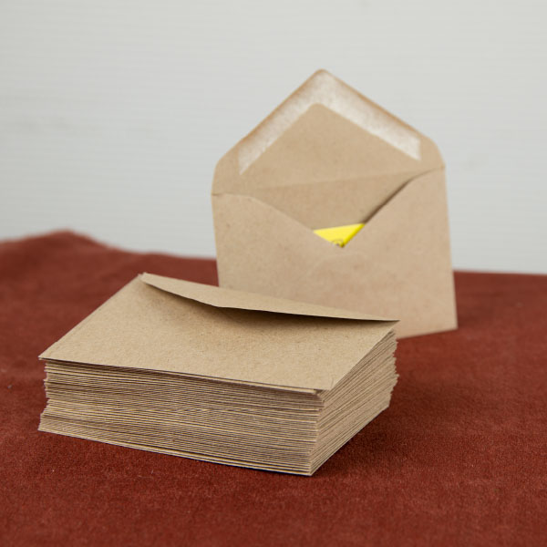 Крафт конверты с треугольным клапаном купить оптом в Челябинске